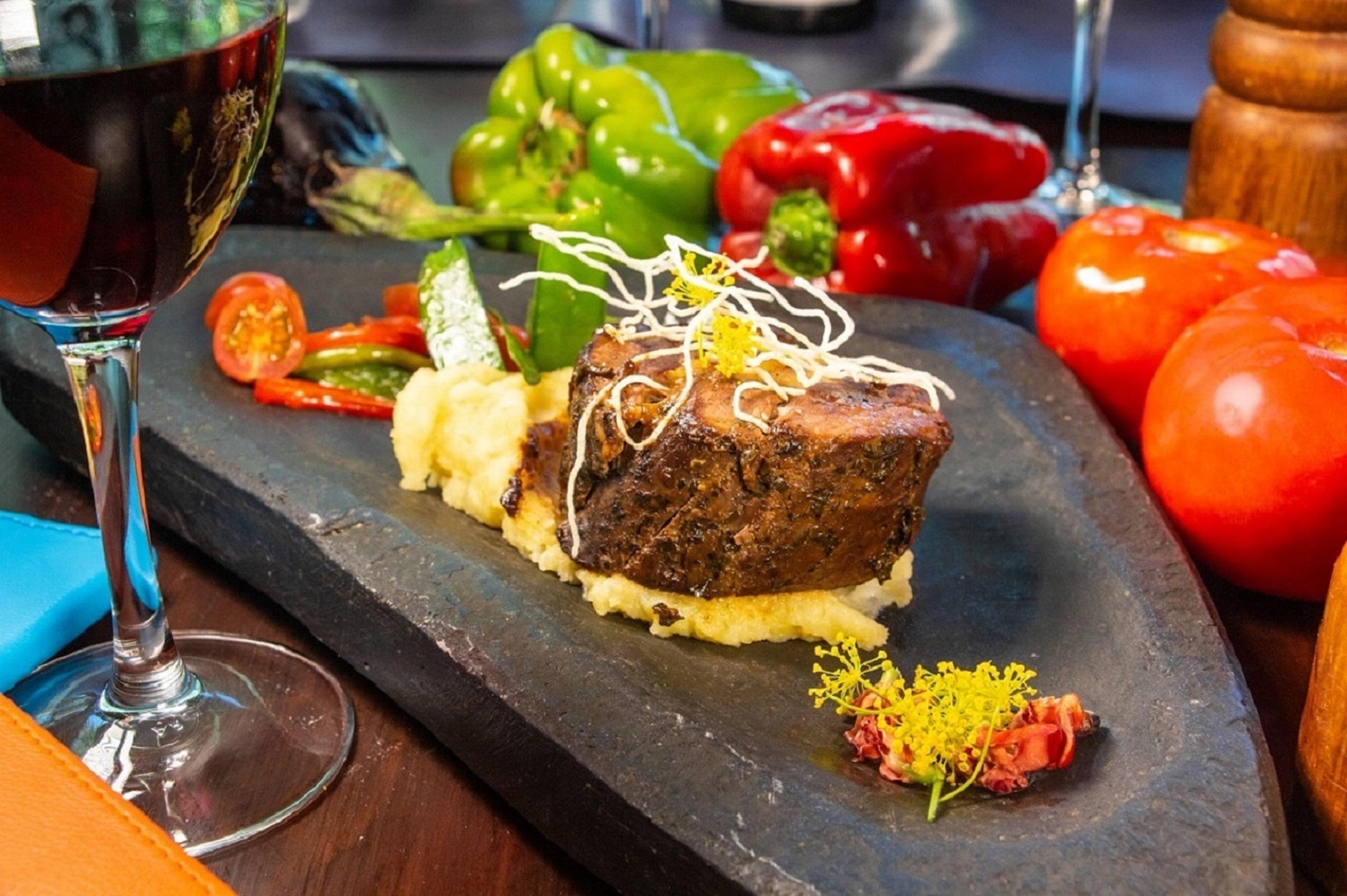 Sonesta Hotel Osorno Eksteriør bilde A steak prepared with a black truffle